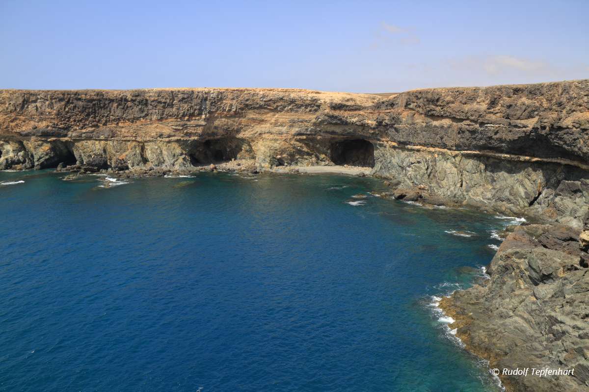 Black volcanic caves on the coast near Ajuy village, Fuerteventu