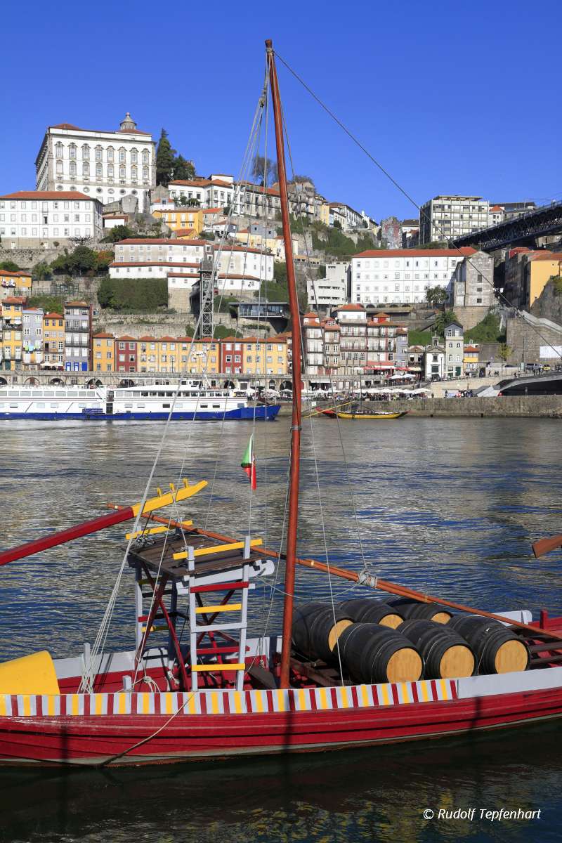 Traditional rabelo boats, Porto city skyline, Douro river and an