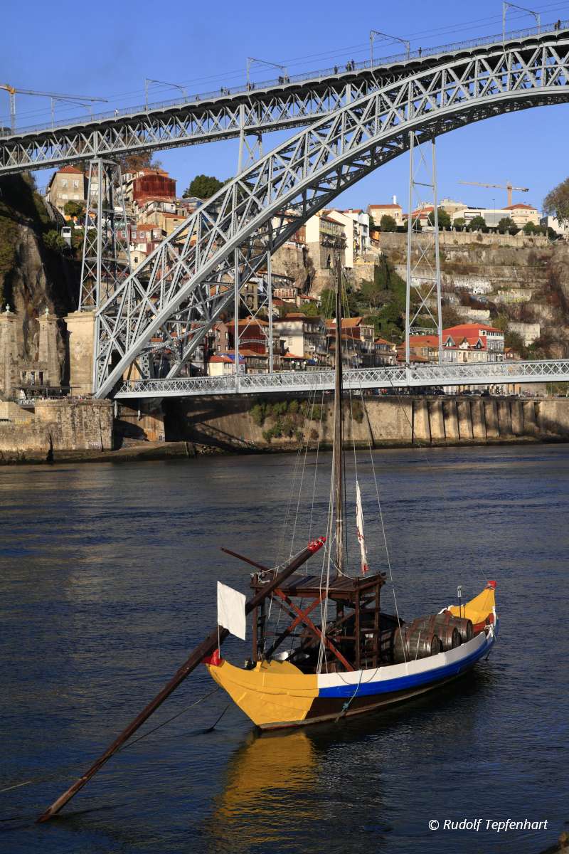 Traditional rabelo boats, Porto city skyline, Douro river and an